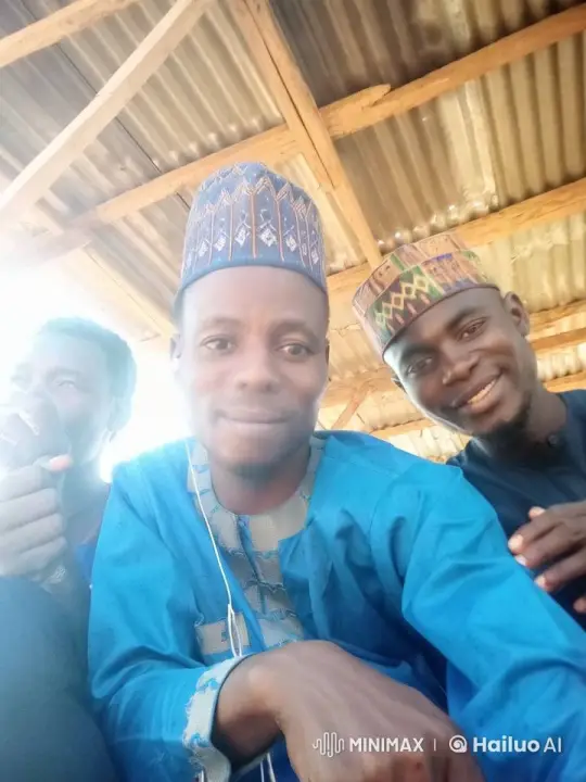 Traditional Hausa Attire Under Rustic Shelter – AI Generated Video | Hailuo AI