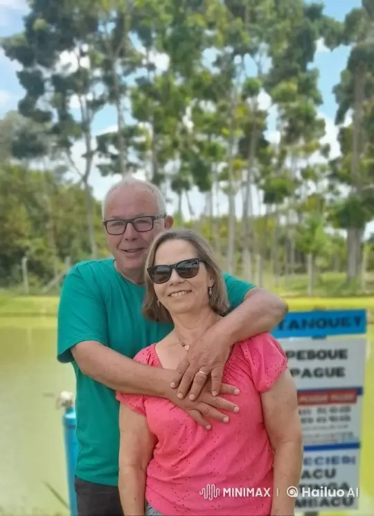 Couple Embracing in Peaceful Pond Setting – AI Generated Video | Hailuo AI