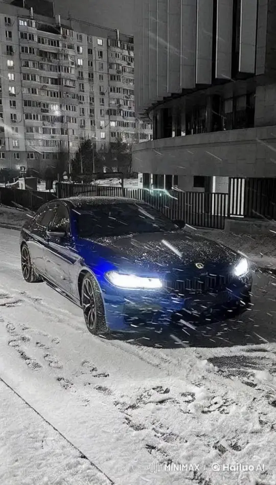 Sleek Car Navigates Snowy Urban Landscape – AI Generated Video | Hailuo AI
