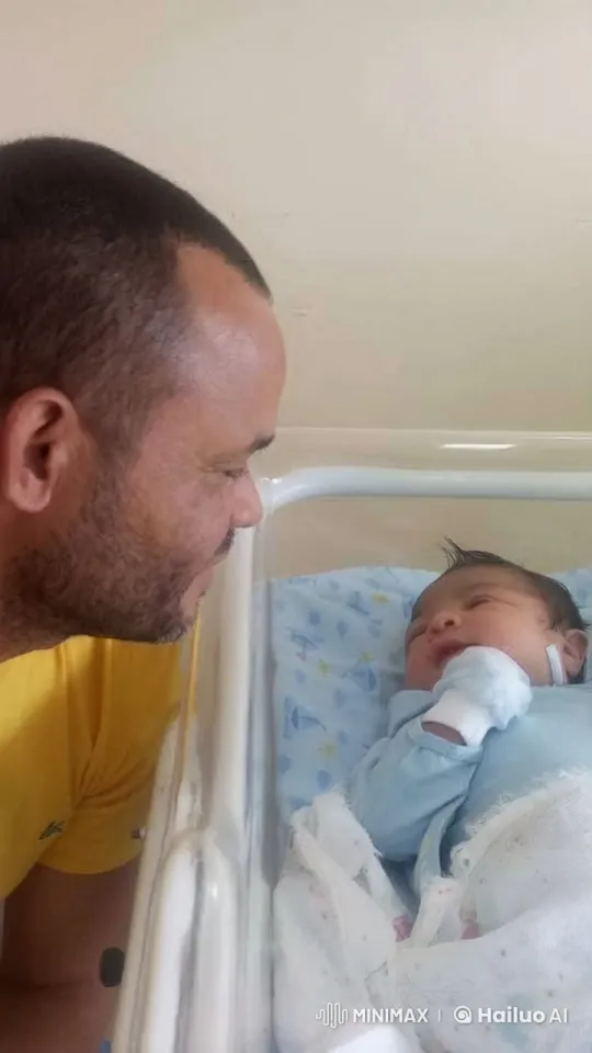 Man and Newborn Exchange Tender Glances – AI Generated Video | Hailuo AI