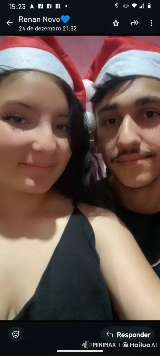 Couple in Santa Hats Takes Festive Selfie – AI Generated Video | Hailuo AI