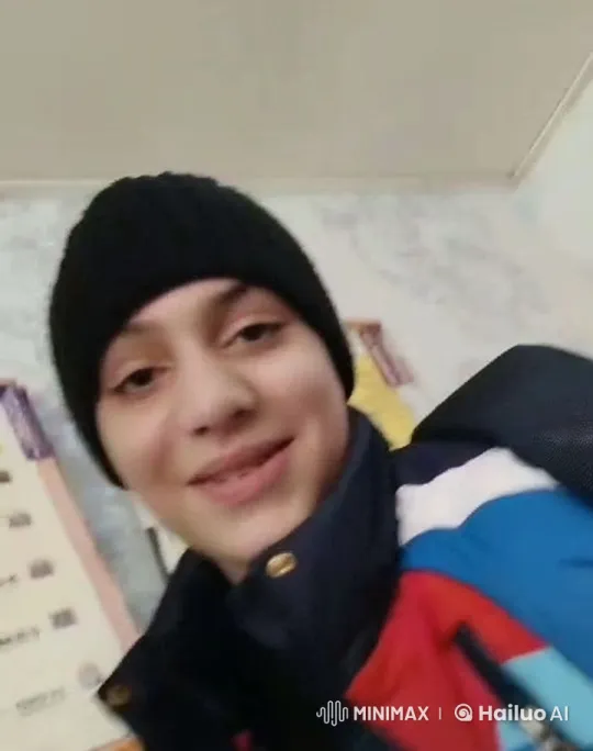 Young Person Smiling in Cozy Indoor Setting – AI Generated Video | Hailuo AI