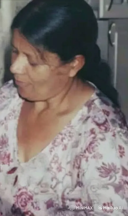 Woman in Kitchen Engaged in Task with Gentle Movements – AI Generated Video | Hailuo AI