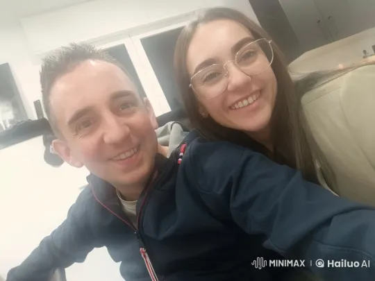 Couple Sharing Intimate Moment in Well-Lit Room – AI Generated Video | Hailuo AI