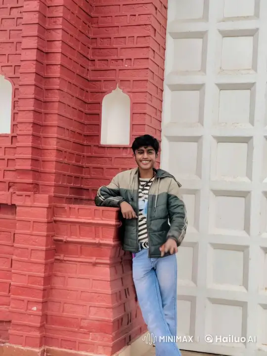 Smiling Person Blows Kiss Against Colorful Brick Wall – AI Generated Video | Hailuo AI