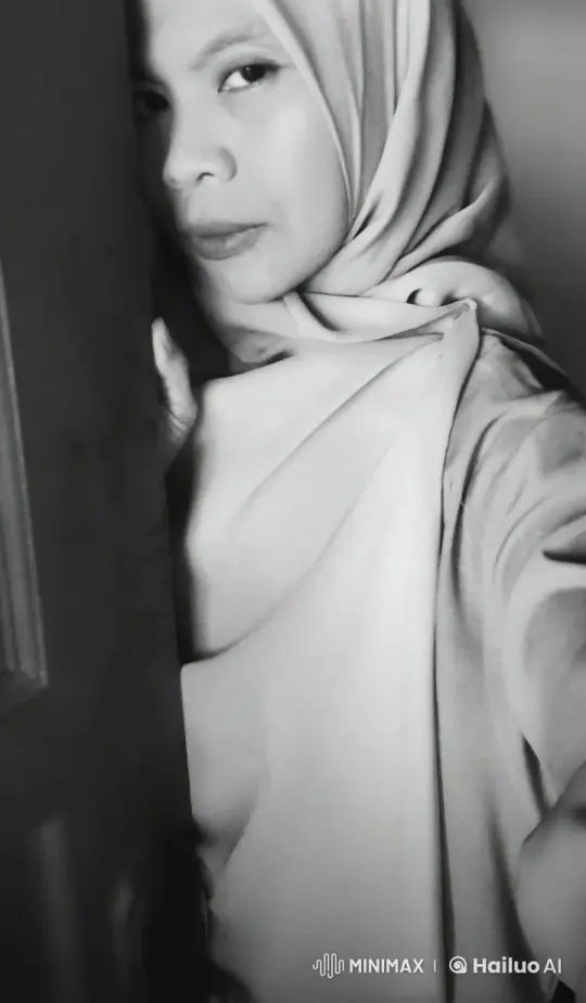 Serene Figure by Door with Swaying Fabric – AI Generated Video | Hailuo AI