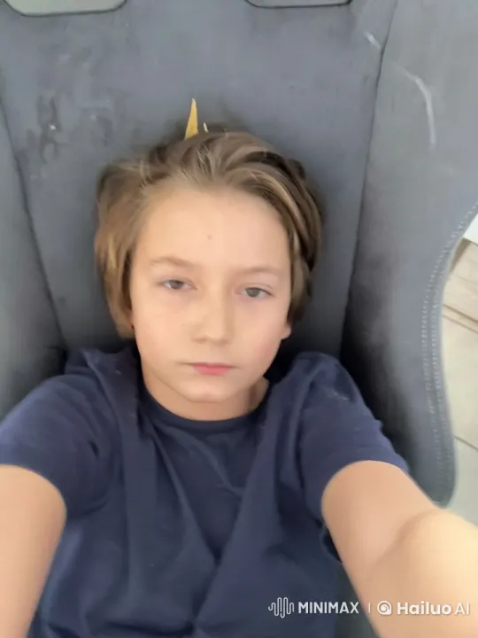 Boy Expresses Joy with Calm and Relaxed Demeanor – AI Generated Video | Hailuo AI