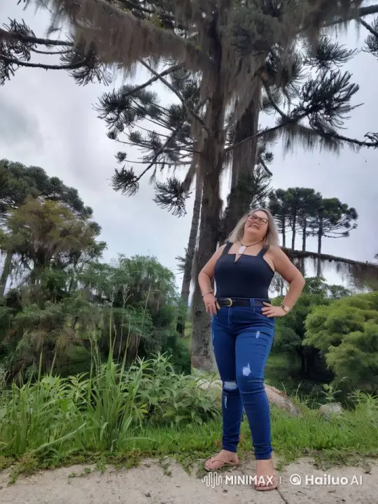 Woman Joyfully Waves in Serene Nature Setting – AI Generated Video | Hailuo AI