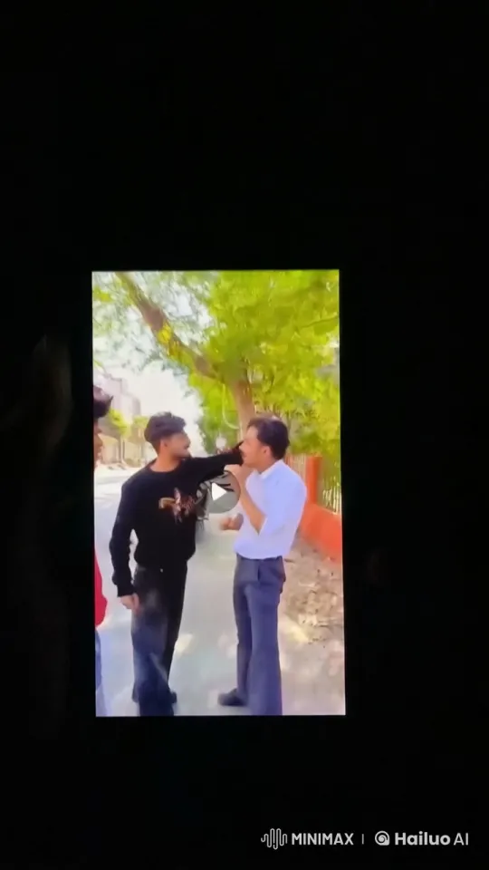 Two Men Tenderly Kiss on Sidewalk – AI Generated Video | Hailuo AI