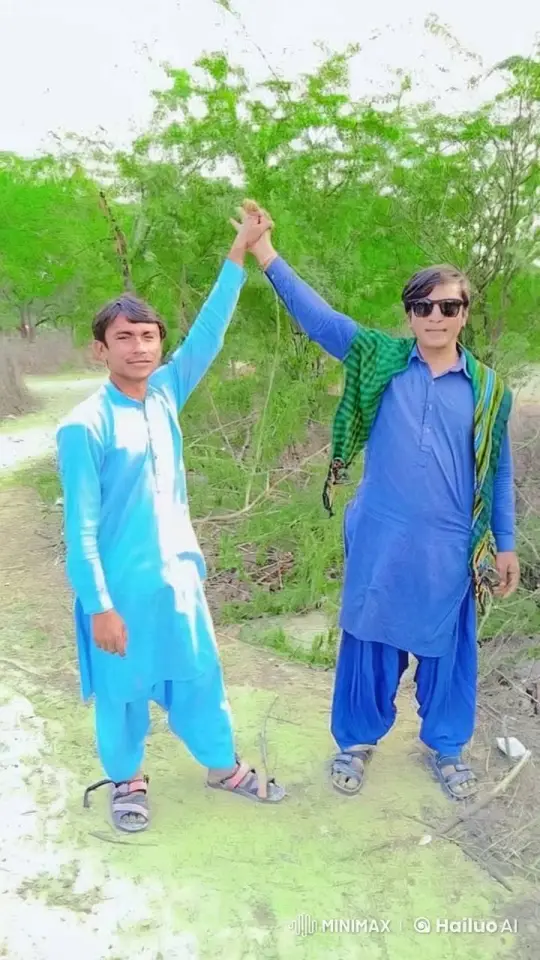 Two Men in Blue Attire Clasping Hands in Nature – AI Generated Video | Hailuo AI