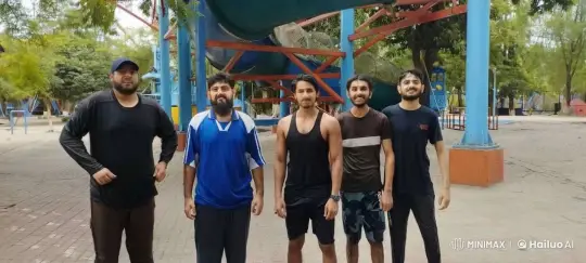 Five Men Engage in Playful Fight at Playground – AI Generated Video | Hailuo AI