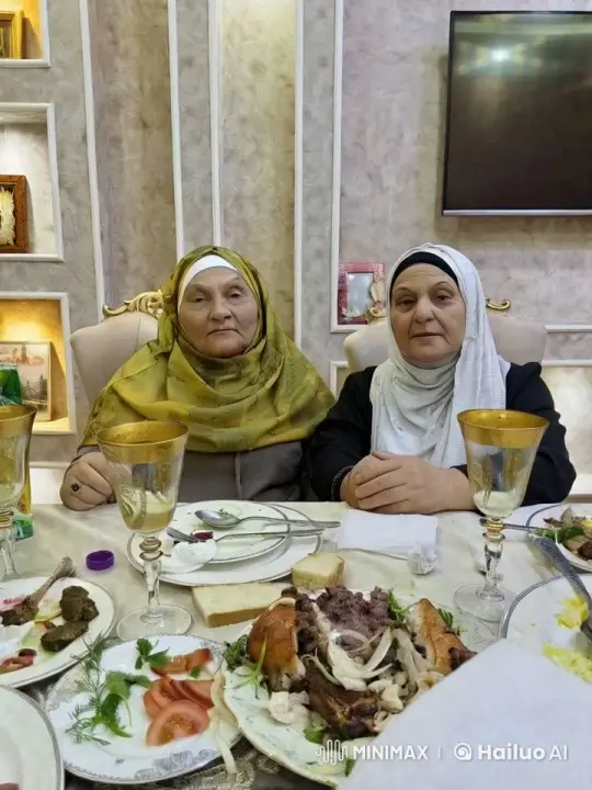 Elderly Women Share Affectionate Hug at Dining Table – AI Generated Video | Hailuo AI
