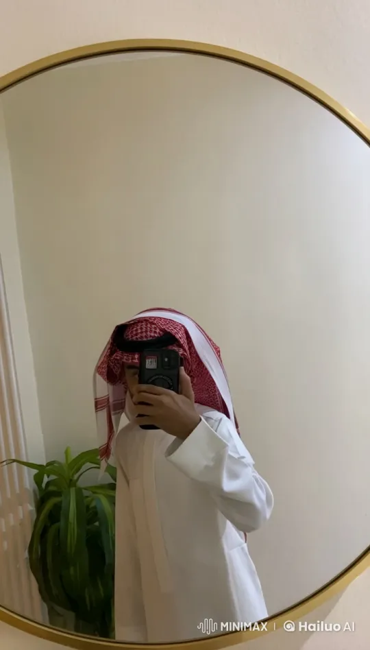 Young Man in Traditional Attire Takes Selfie and Smokes – AI Generated Video | Hailuo AI