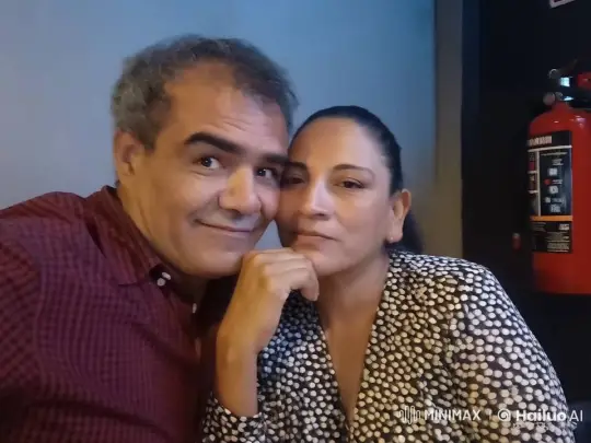Couple Poses for Intimate Selfie with Subtle Gestures – AI Generated Video | Hailuo AI
