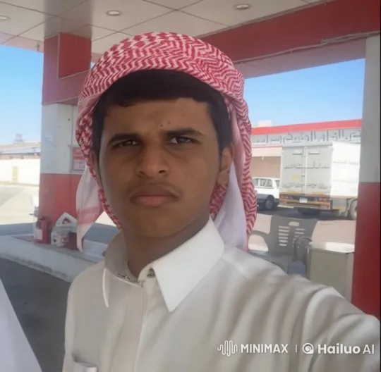 Young Man Contemplates with a Cigarette at a Gas Station – AI Generated Video | Hailuo AI