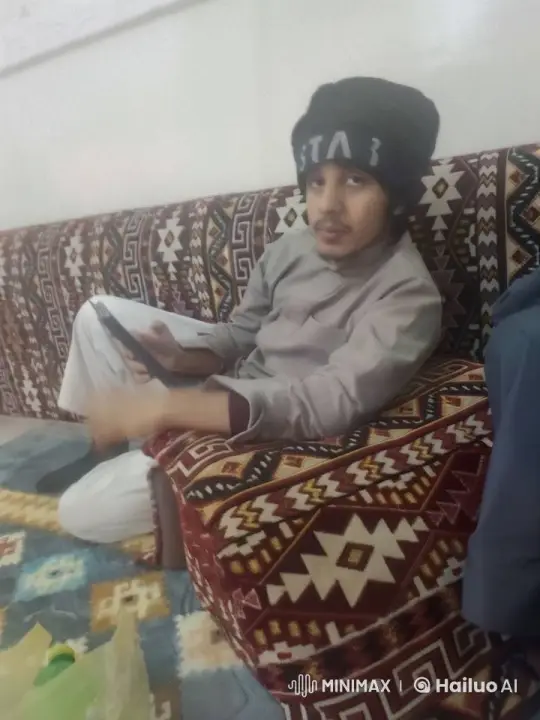 Young Man Reflecting on Couch with Cigarette – AI Generated Video | Hailuo AI