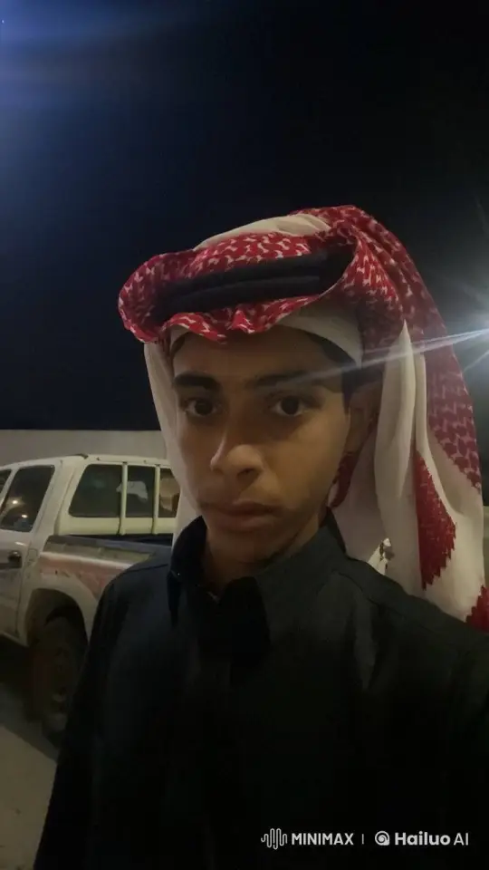 Young Man Smokes Cigarette Outdoors at Night – AI Generated Video | Hailuo AI
