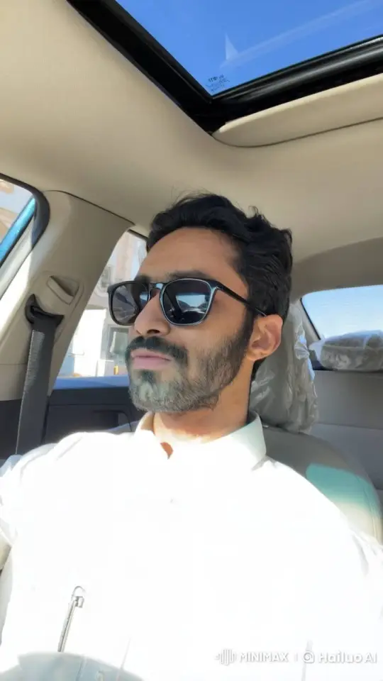 Man Smokes Calmly in Sunlit Car Interior – AI Generated Video | Hailuo AI