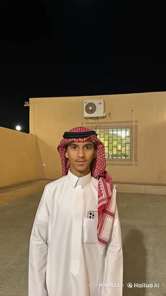 Young Man in Thobe Stands Outside at Night – AI Generated Video | Hailuo AI