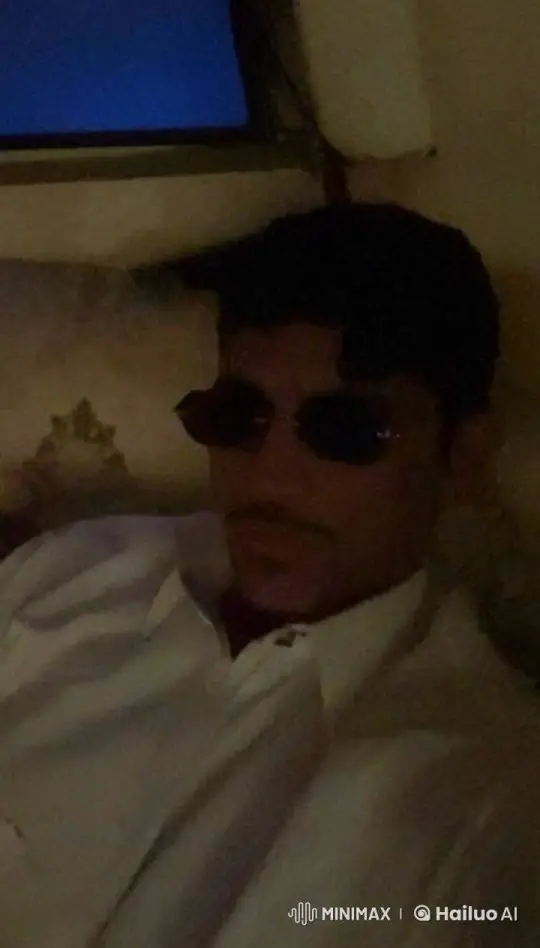 Man Smokes Pipe in Dimly Lit Room – AI Generated Video | Hailuo AI