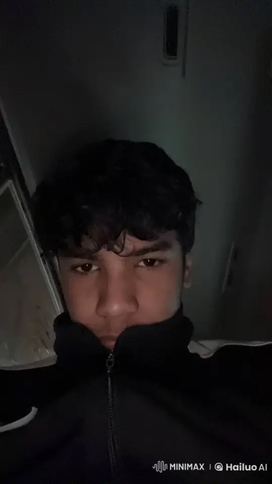 Young Man Reflects in Monochrome with Cigarette Smoke – AI Generated Video | Hailuo AI