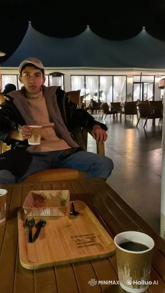 Young Man Enjoying Night Out Smoking and Sipping Beverage – AI Generated Video | Hailuo AI