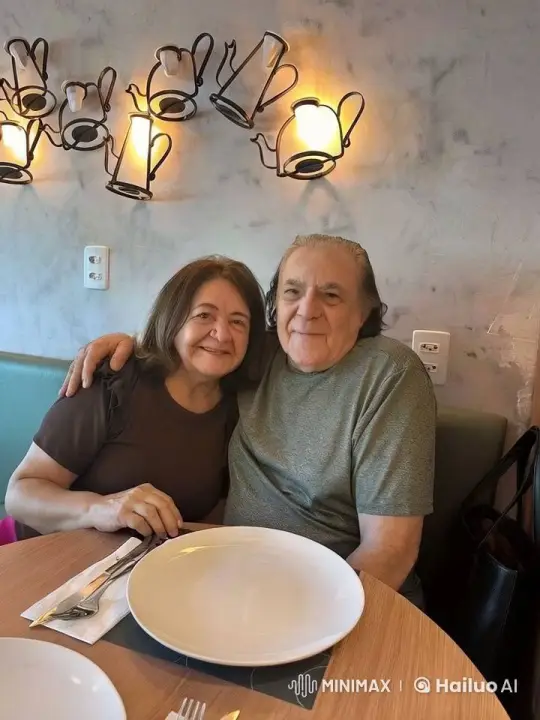 Elderly Couple's Affectionate Moment in Café – AI Generated Video | Hailuo AI