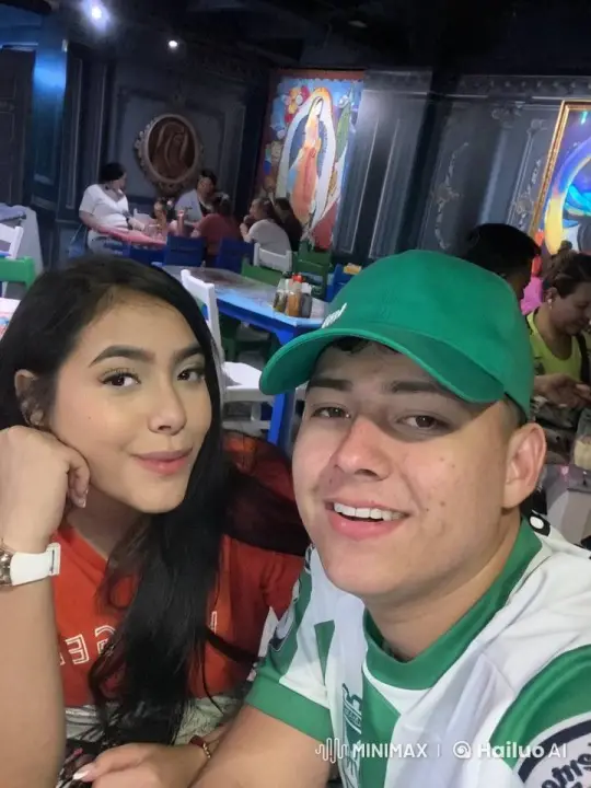 Young Couple Celebrates in Lively Restaurant – AI Generated Video | Hailuo AI