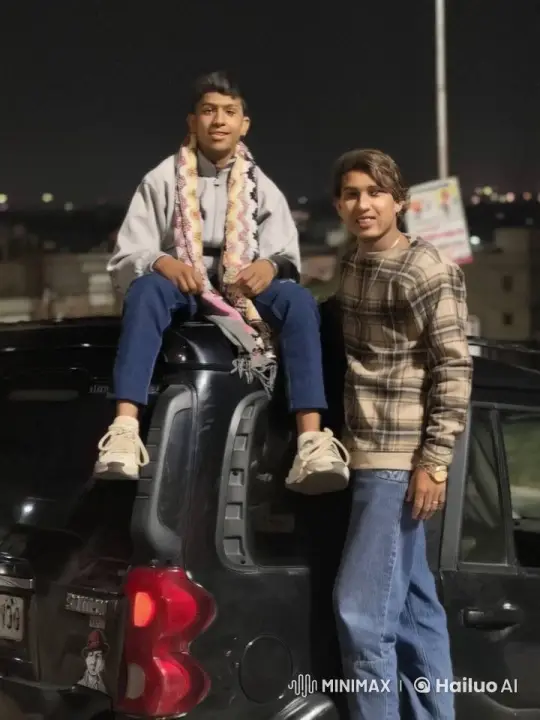 Two Young Men Share Affectionate Kiss in Urban Night – AI Generated Video | Hailuo AI