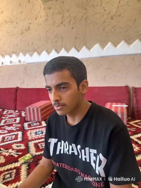 Young Man Relaxing with Cigarette on Patterned Rug – AI Generated Video | Hailuo AI