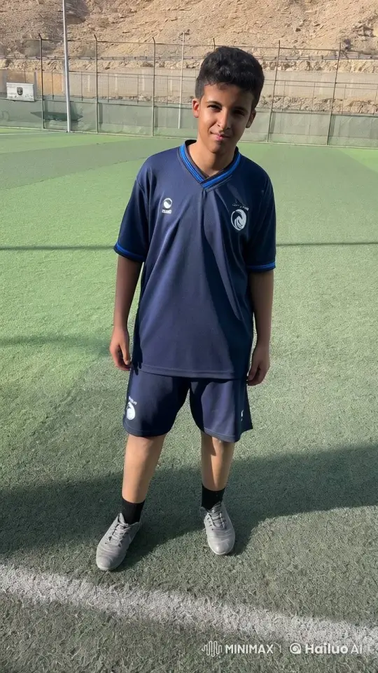 Boy on Soccer Field Contemplates with Cigarette – AI Generated Video | Hailuo AI