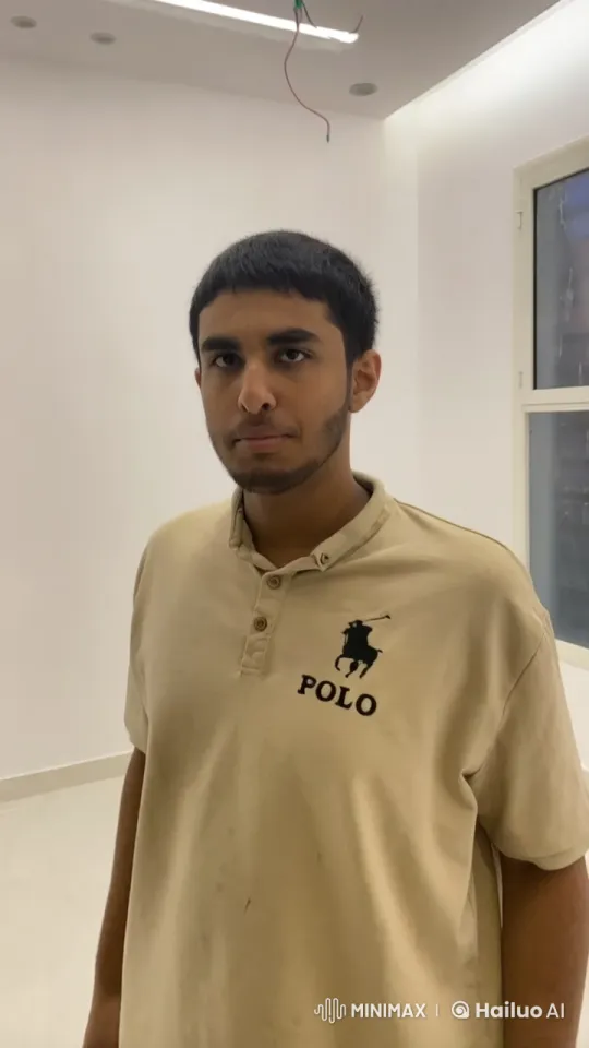 Young Man Smoking Calmly in Minimalist Setting – AI Generated Video | Hailuo AI