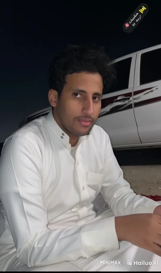 Young Man Smoking by Vehicle at Night – AI Generated Video | Hailuo AI