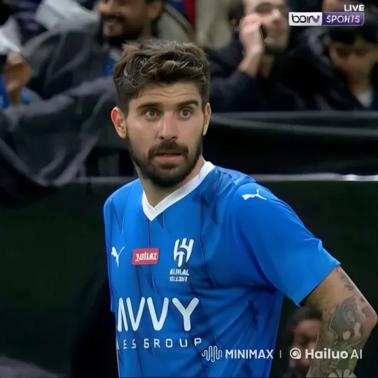 Footballer's Intense Focus Amidst Game Break – AI Generated Video | Hailuo AI