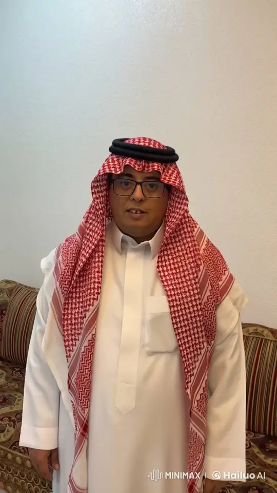 Man in Traditional Attire Smoking Calmly Indoors – AI Generated Video | Hailuo AI