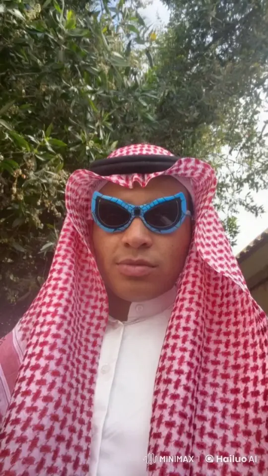 Man in Traditional Attire Smokes Amidst Serene Nature – AI Generated Video | Hailuo AI