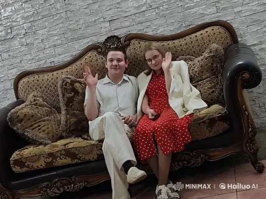 Young Couple Shares Intimate Kiss on Ornate Sofa – AI Generated Video | Hailuo AI
