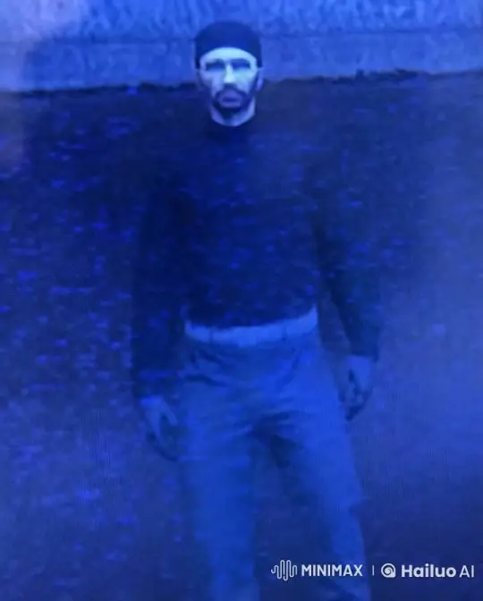 Man Smoking in Dark Background with Blue-Tinted Lighting – AI Generated Video | Hailuo AI