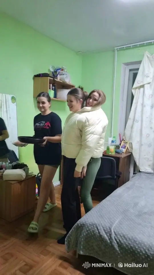 Three Women Spontaneously Dance in Cozy Green Room – AI Generated Video | Hailuo AI
