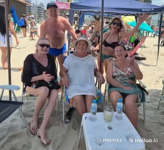 Beach Friends Enjoying Warm Embraces and Laughter – AI Generated Video | Hailuo AI