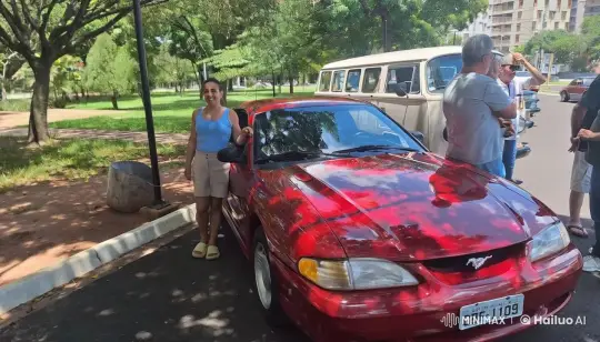Woman Smiles Beside Shiny Red Car in Park – AI Generated Video | Hailuo AI