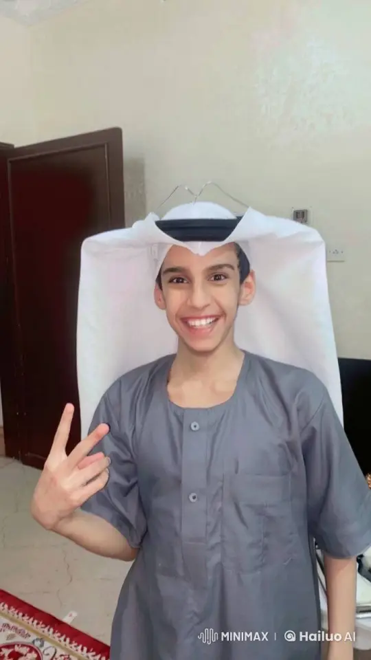 Young Person Smiling, Holding Peace Sign, and Smoking Indoors – AI Generated Video | Hailuo AI