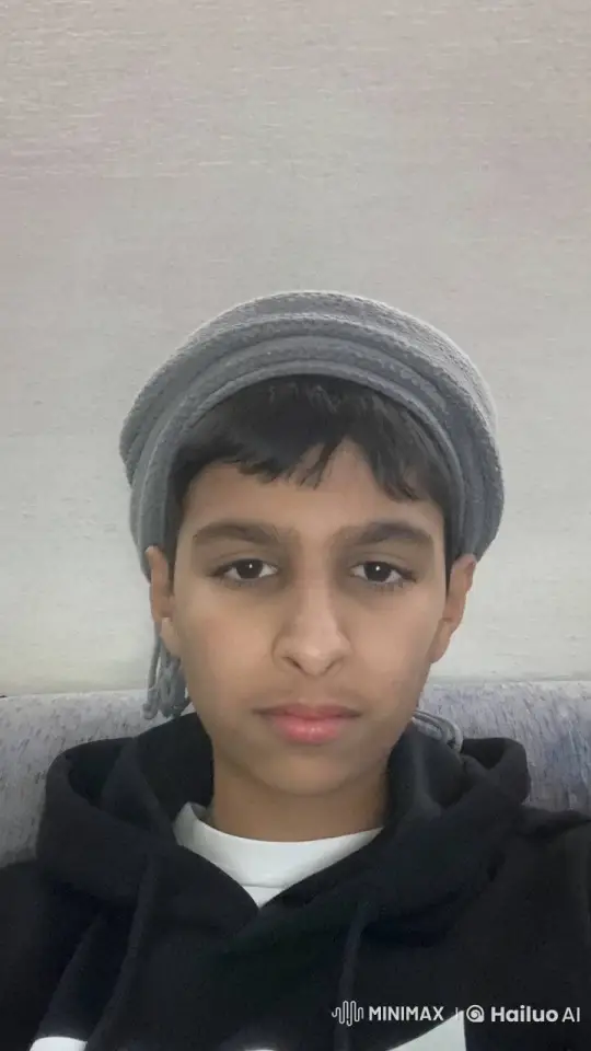 Boy Smokes Cigarette on Couch in Calm Scene – AI Generated Video | Hailuo AI