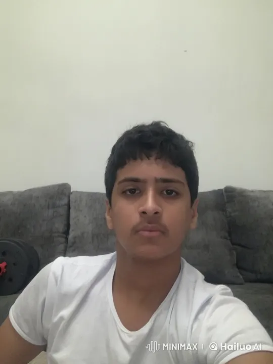 Young Individual Smoking on Couch – AI Generated Video | Hailuo AI