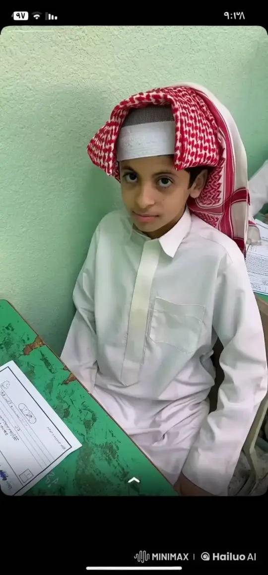 Young Boy Smokes in Traditional Attire in Quiet Classroom – AI Generated Video | Hailuo AI