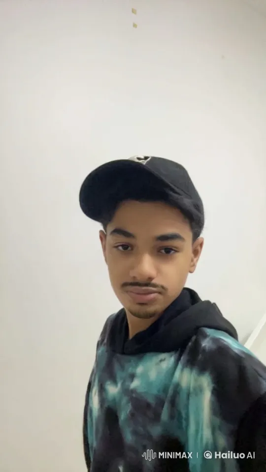 Young Man Reflects with a Cigarette in Calm Setting – AI Generated Video | Hailuo AI