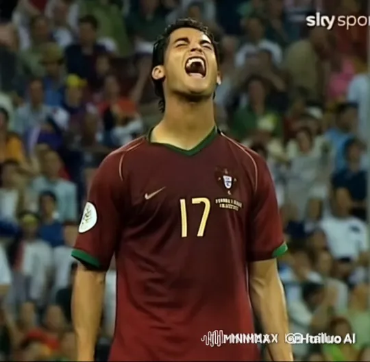 Soccer Player in Maroon and Green Jersey Smokes on Field – AI Generated Video | Hailuo AI