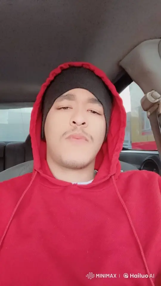 Young Man Reflects in Car Smoking Cigarette – AI Generated Video | Hailuo AI