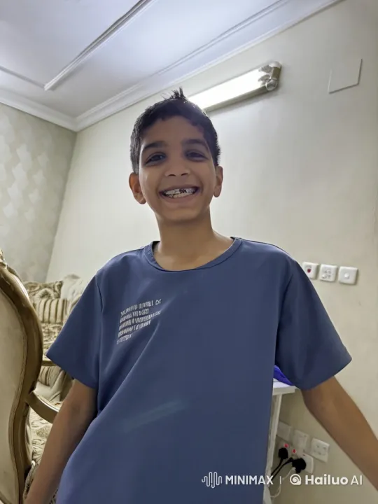 Young Boy Smokes Casually in Static Room Setting – AI Generated Video | Hailuo AI