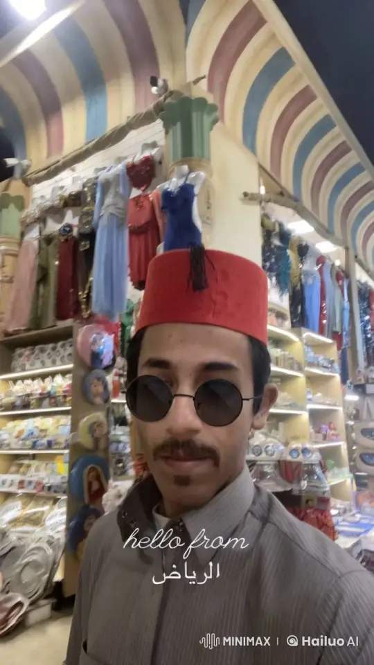 Relaxed Man Smokes in Bustling Riyadh Shop – AI Generated Video | Hailuo AI